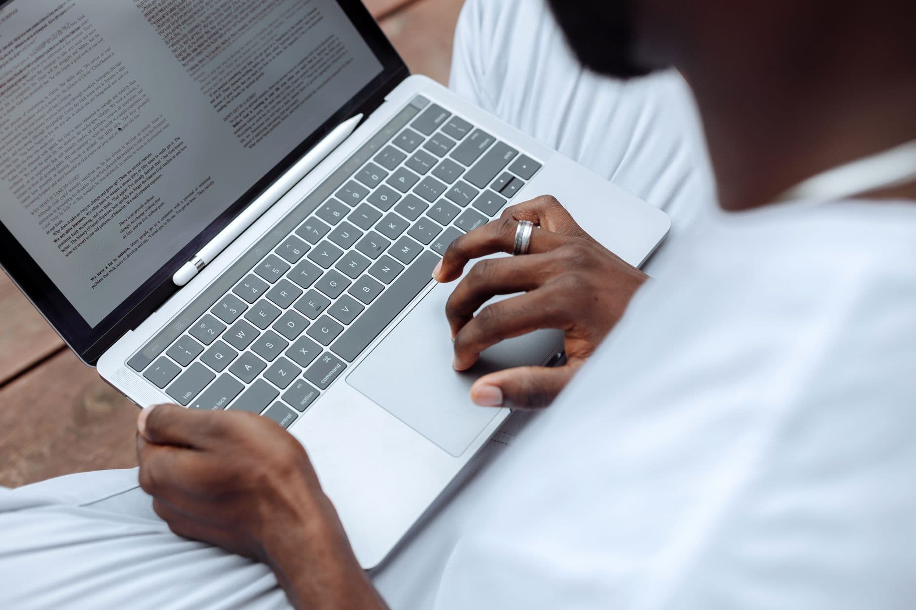 Close-up of someone reading a text document on a laptop screen